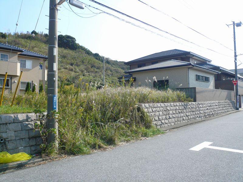 Local photos, including front road. Local land photo 11