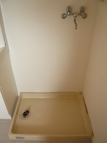 Other Equipment. Washing machine in the room