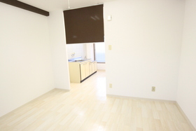 Living and room. We have established the role curtain between the kitchen and the room