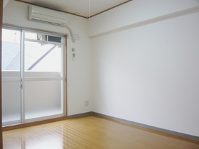 Living and room. It comes with air conditioning