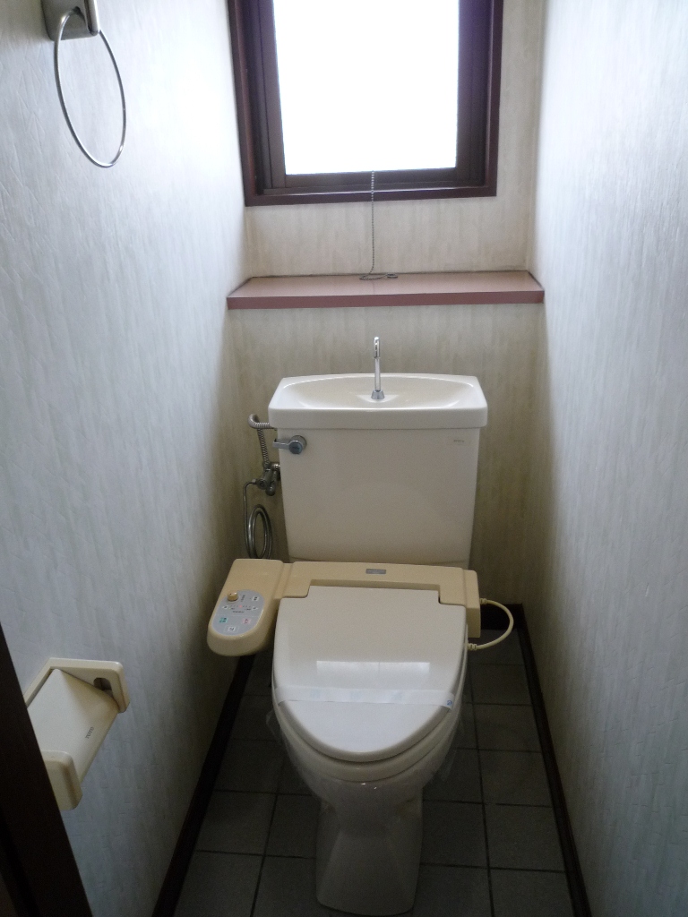 Toilet. Washlet is with