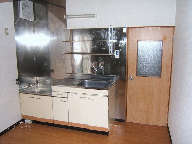 Kitchen. Convenience is the top of the hanging cupboard.