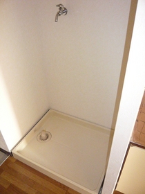Other Equipment. Washing machine storage room