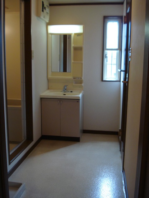 Other room space. There is a window to the washroom next to. 