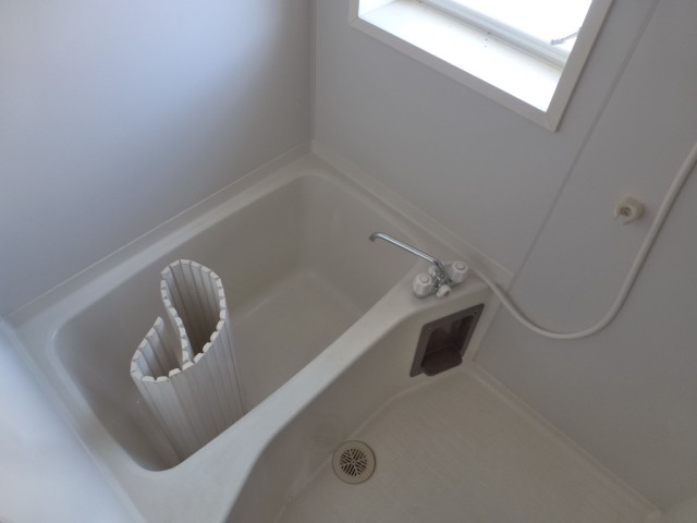 Bath. It is a window with a bathroom