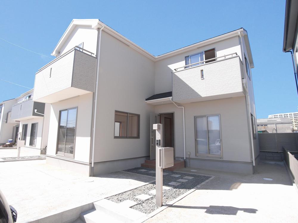 Local appearance photo. The photograph is a model house