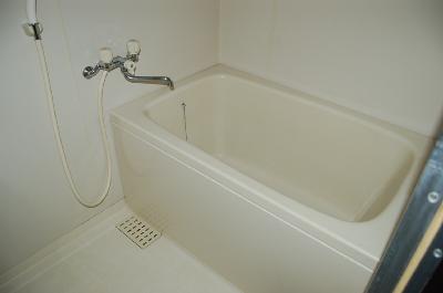 Bath. A clean bathroom (photo is the same type room)