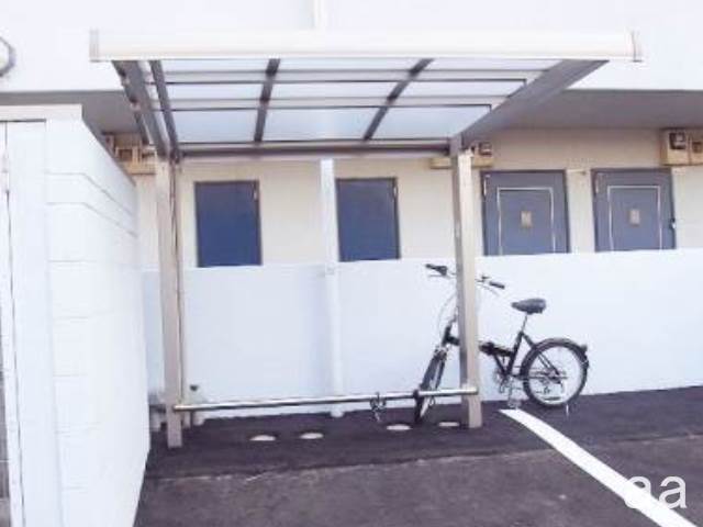 Other common areas. There is parking lot with a roof on site