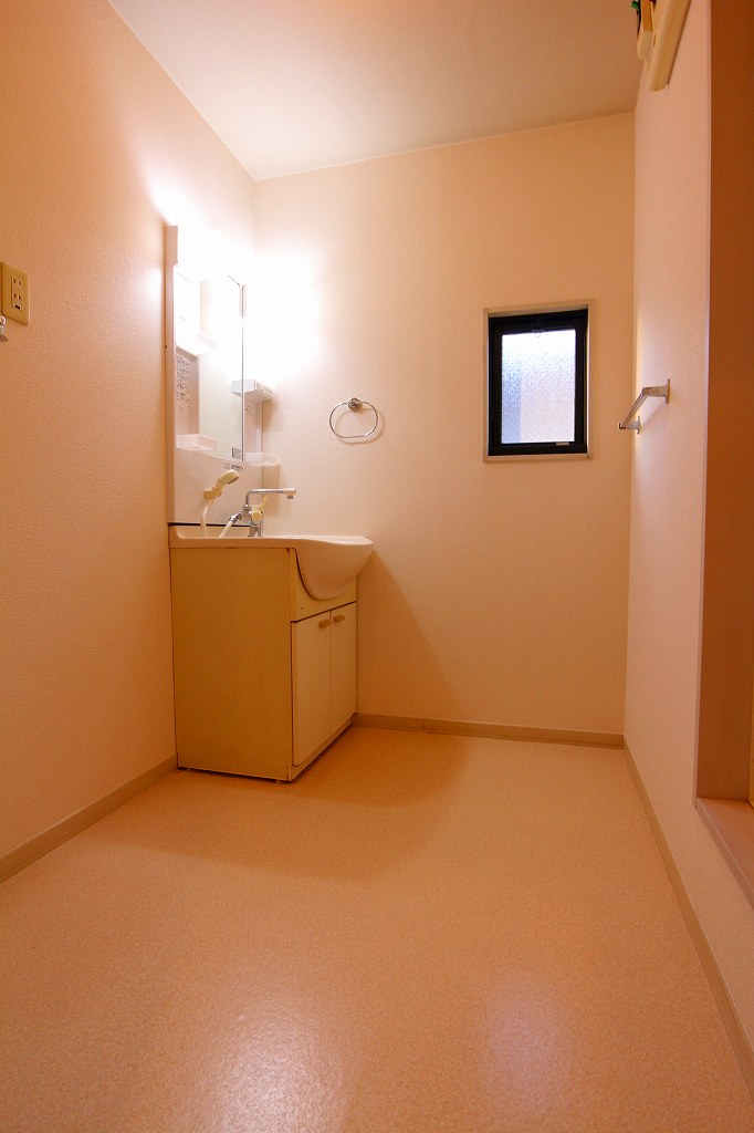 Washroom. There basin dressing room window.