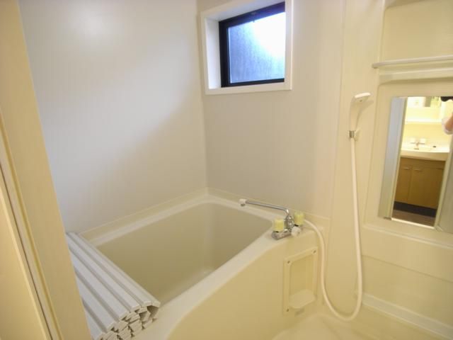 Bath. Rectangular tub is.