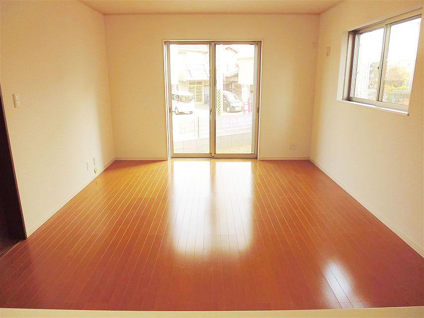 Living. Bright and wide over have living as seen from the kitchen