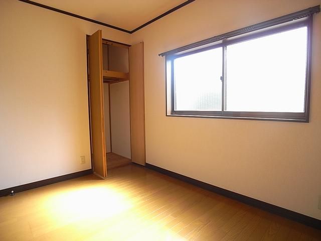 Living and room. It has a window next to. 