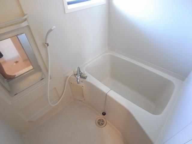 Bath. Rectangular tub is.