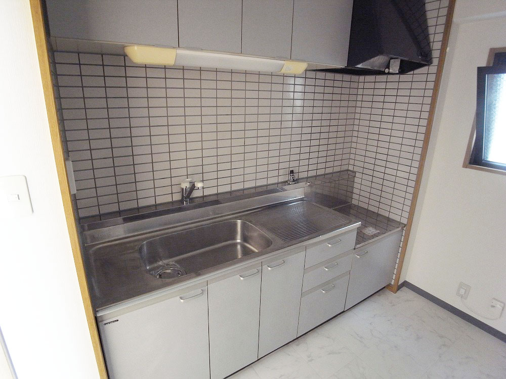 Kitchen. Two-burner gas stove installation Allowed with window