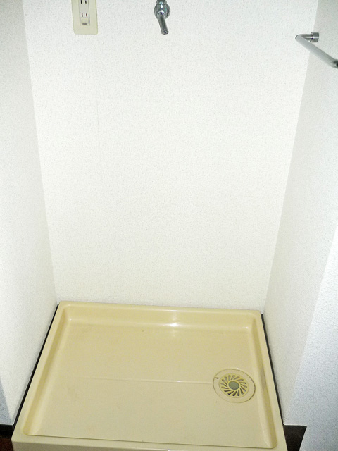 Other Equipment. Washing machine in the room