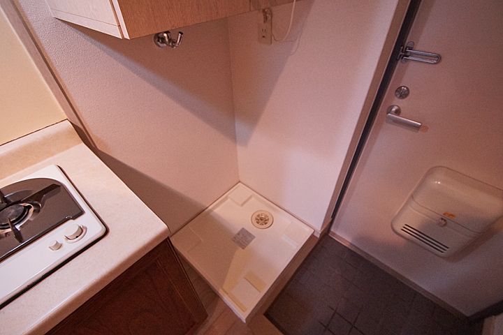 Other Equipment. Washing machine in the room