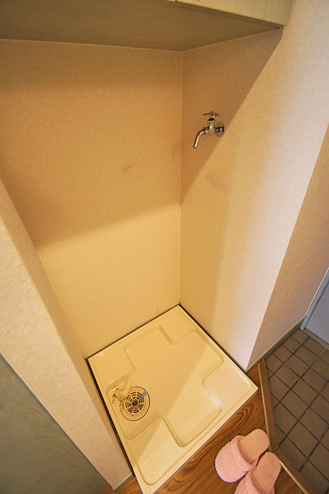 Other Equipment. Washing machine in the room