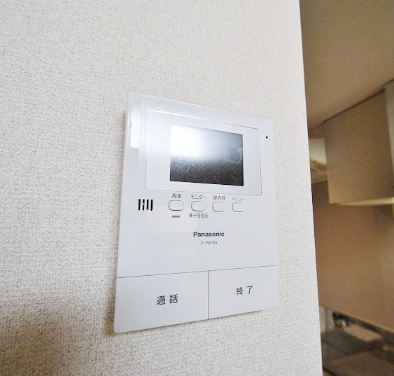 Security. TV monitor with a phone of peace of mind