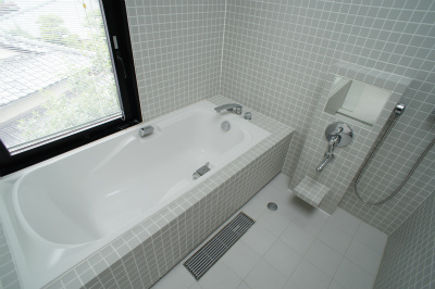 Bath. It is a beautiful bath with a window.