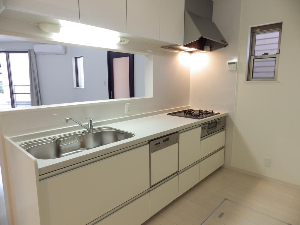 Kitchen. Artificial marble counter kitchen with top plate prosper. 