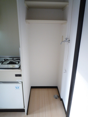 Other Equipment. Washing machine in the room