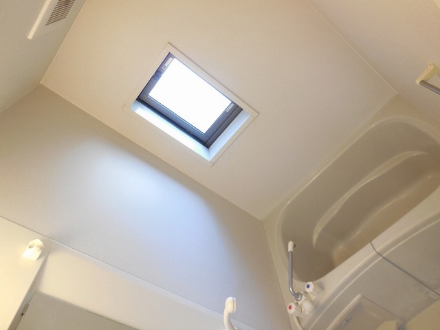 Bath. There is a window in the bath