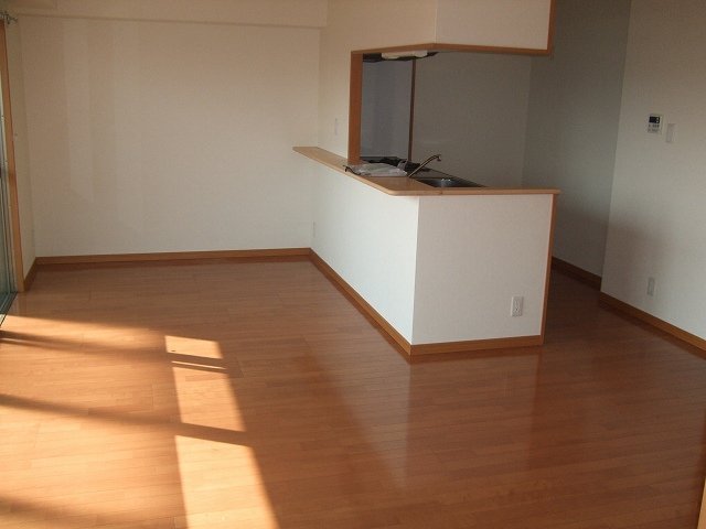 Kitchen. The photograph is a separate, Room