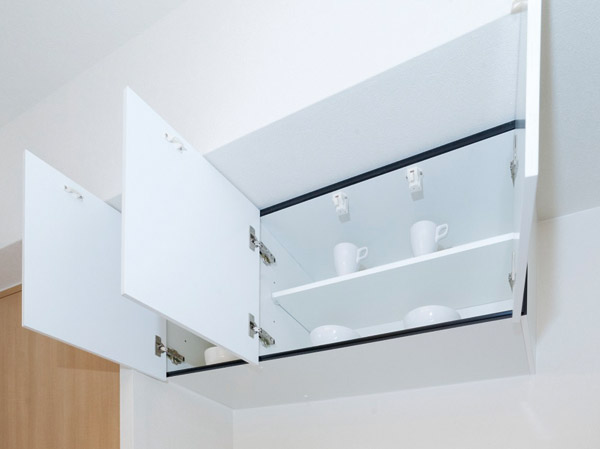 Kitchen.  [Functional and beautiful cupboard Tsuto] Standard equipped with a cupboard Tsuto The kitchen. In addition to the dishes can be neat storage, Also available as a "place where children can not reach.".  ※ Except for the D-type (same specifications)