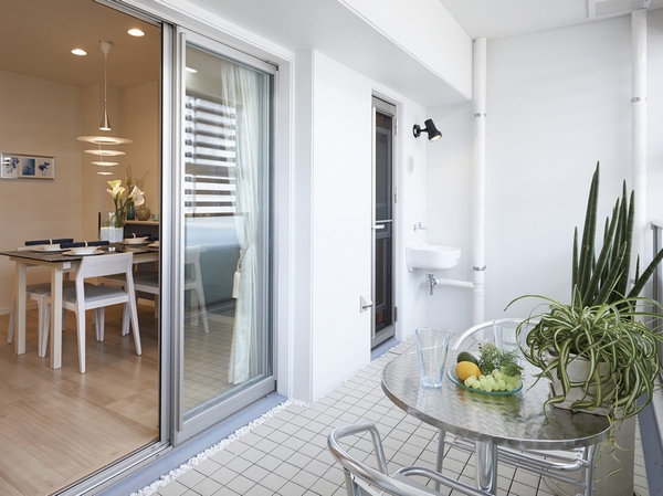 Interior.  [balcony] Balcony of depth 2m to enjoy tea time and gardening.