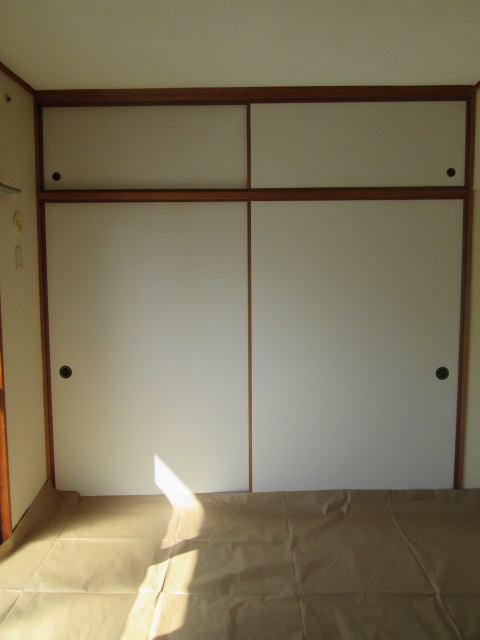 Living and room. There is a balcony is bright Japanese-style room.