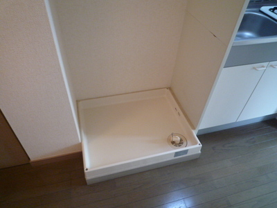 Other Equipment. Washing machine in the room