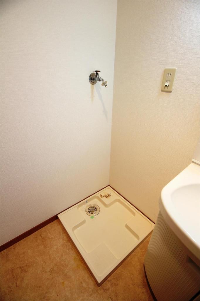 Other Equipment. Washing machine in the room