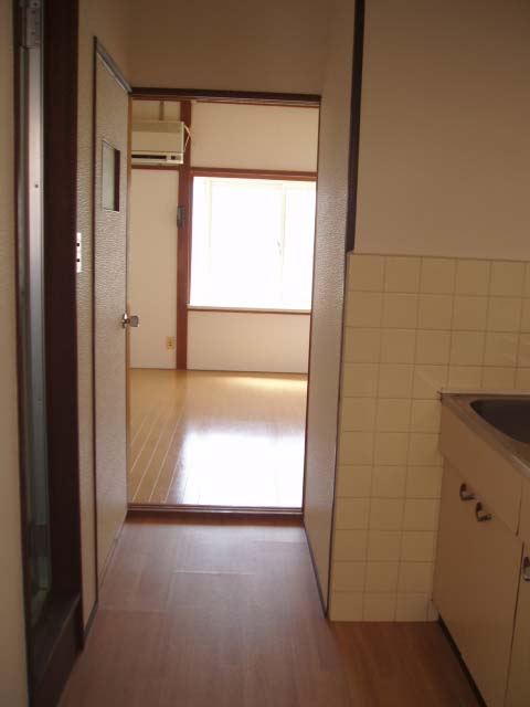 Kitchen. It is a compact kitchen.