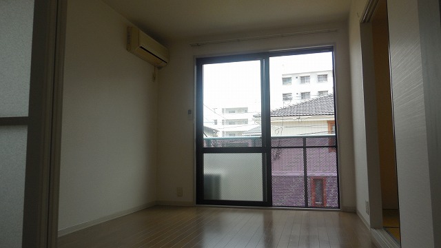 Living and room. South-facing is very bright and the wind feels good