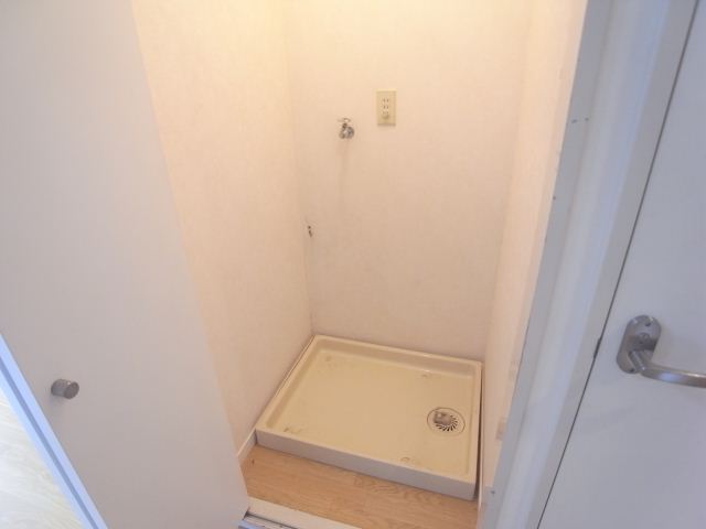 Other Equipment. Washing machine in the room