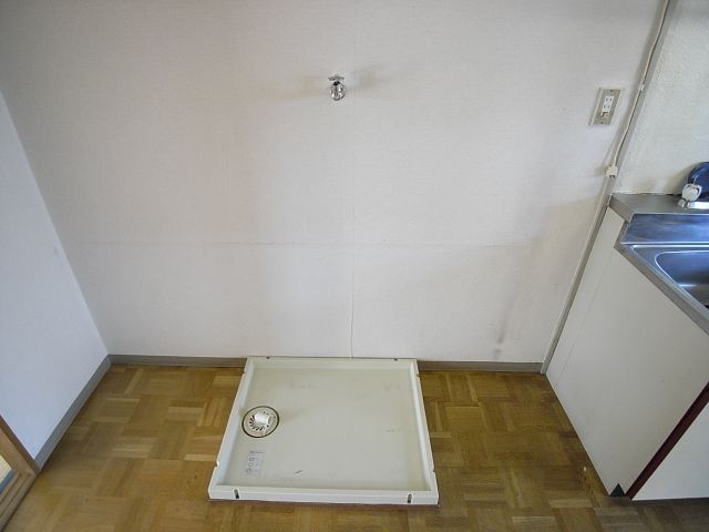 Other Equipment. Washing machine in the room