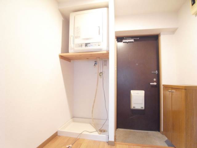 Other Equipment. Washing machine in the room