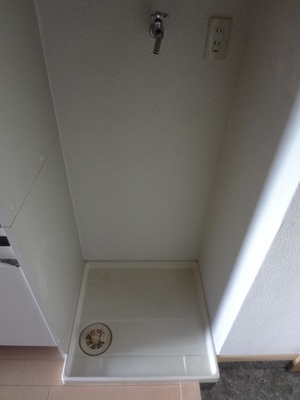 Other Equipment. Washing machine in the room