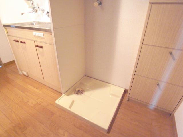 Other Equipment. Washing machine in the room