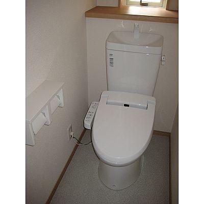 Toilet. Warm water washing toilet seat!