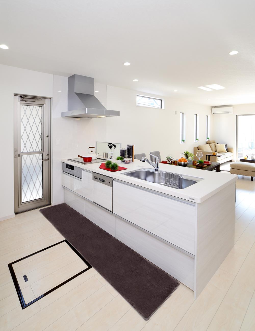 Kitchen with a back door with dish washing dryer with a water purifier. With dish washing dryer