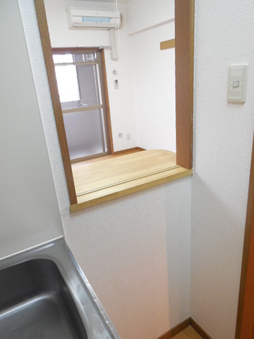 Kitchen. You can see TV while cooking