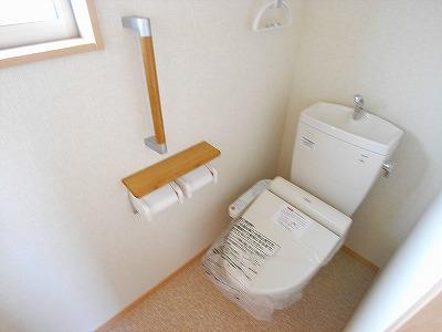 Toilet. The photograph is a property of the same manufacturer and construction