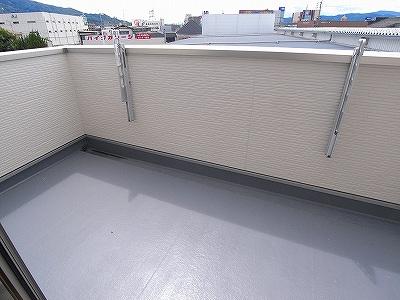 Balcony. The photograph is a property of the same manufacturer and construction