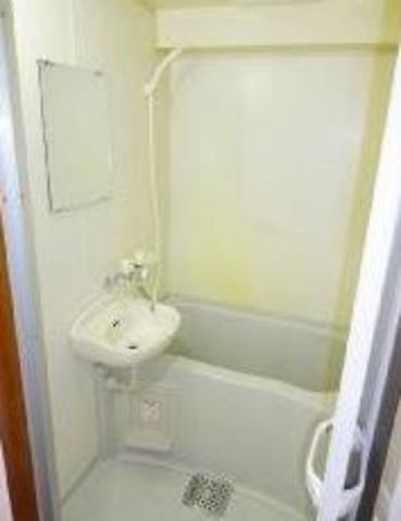 Bath. It is a clean bathroom