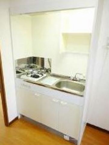 Kitchen. It comes with a 1-burner stove