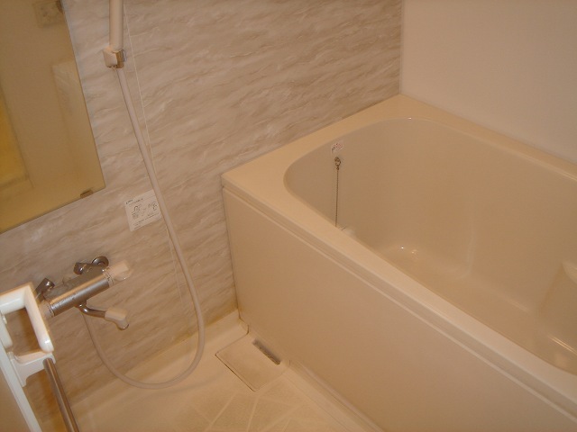 Bath. The photograph is a separate room in the same building