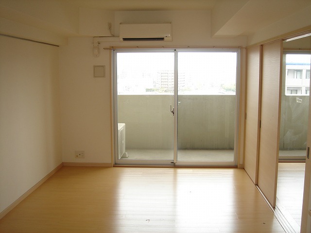 Living and room. The photograph is a separate room in the same building