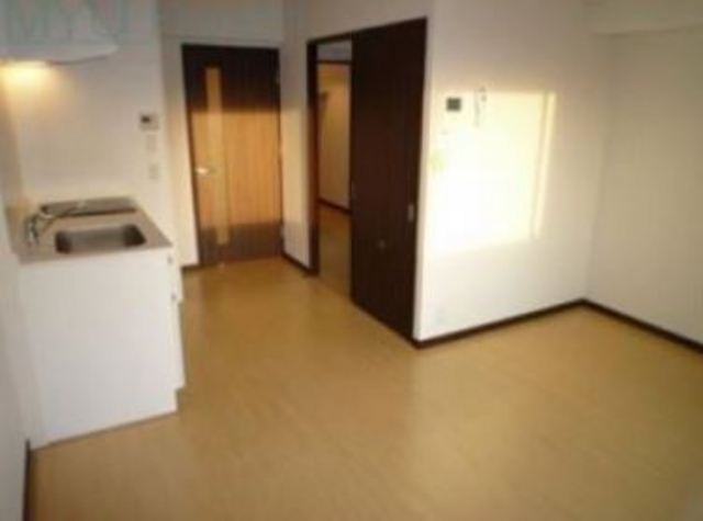 Living and room. The photograph is a separate room in the same building