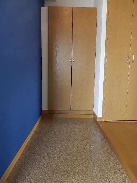 Entrance. The photograph is a separate, Room.